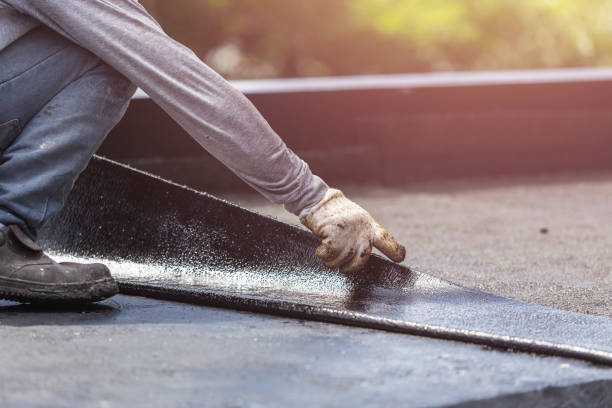 Professional Basement Waterproofing technician working in Barberton, OH